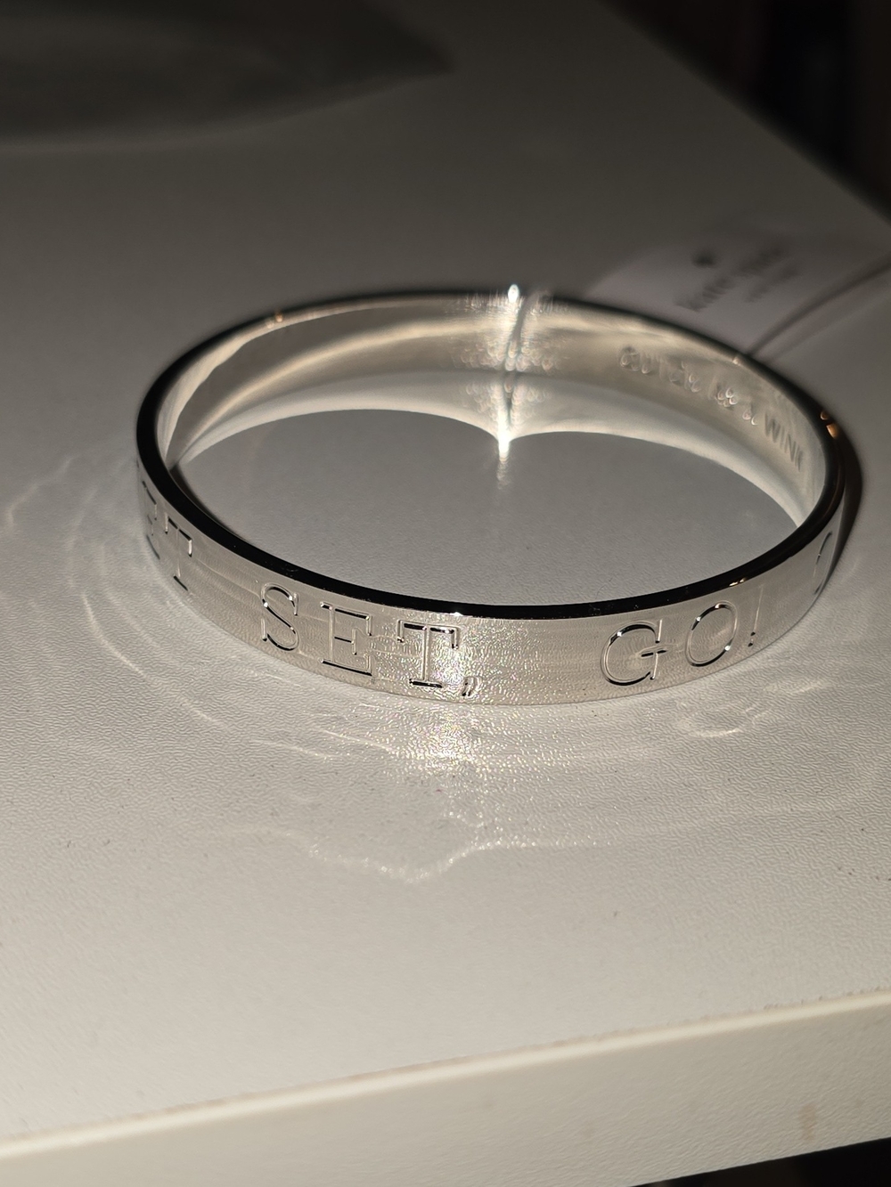 NWT Kate Spade "Quick as a Wink" Silver Tone Idiom Bangle Bracelet "On Your Mark